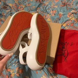 Louboutin 
Manolasummer Flat sandals